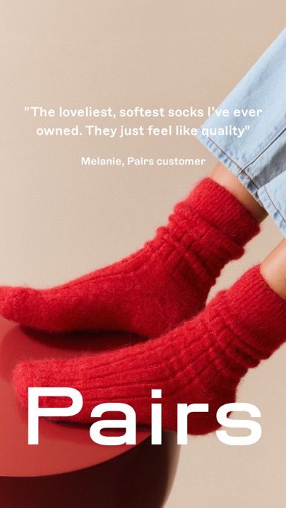 Ad 194: Red alpaca bed socks with a customer quote